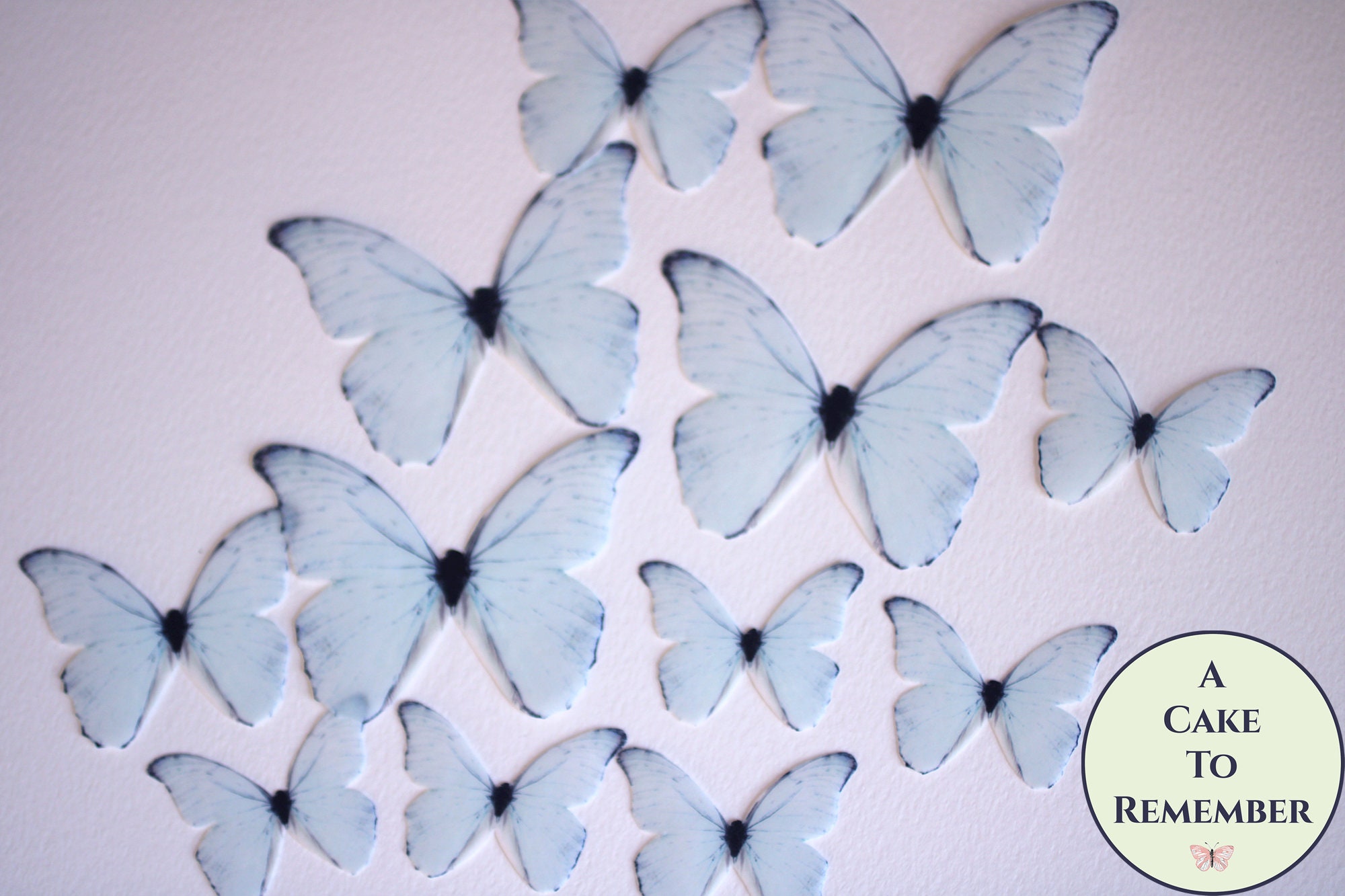 12 Precut Edible Blue Mix(2) Butterflies for cakes and cupcake toppers
