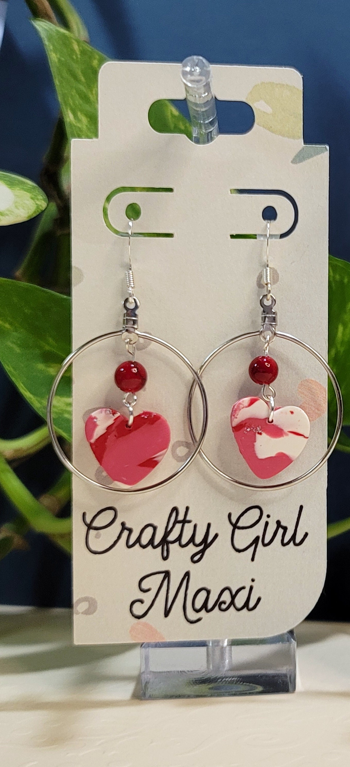 Heart polymer clay earrings. Lightweight earrings. Made in a modern clay  earring designs. Hoops,accent beads, and hearts make a great gift.