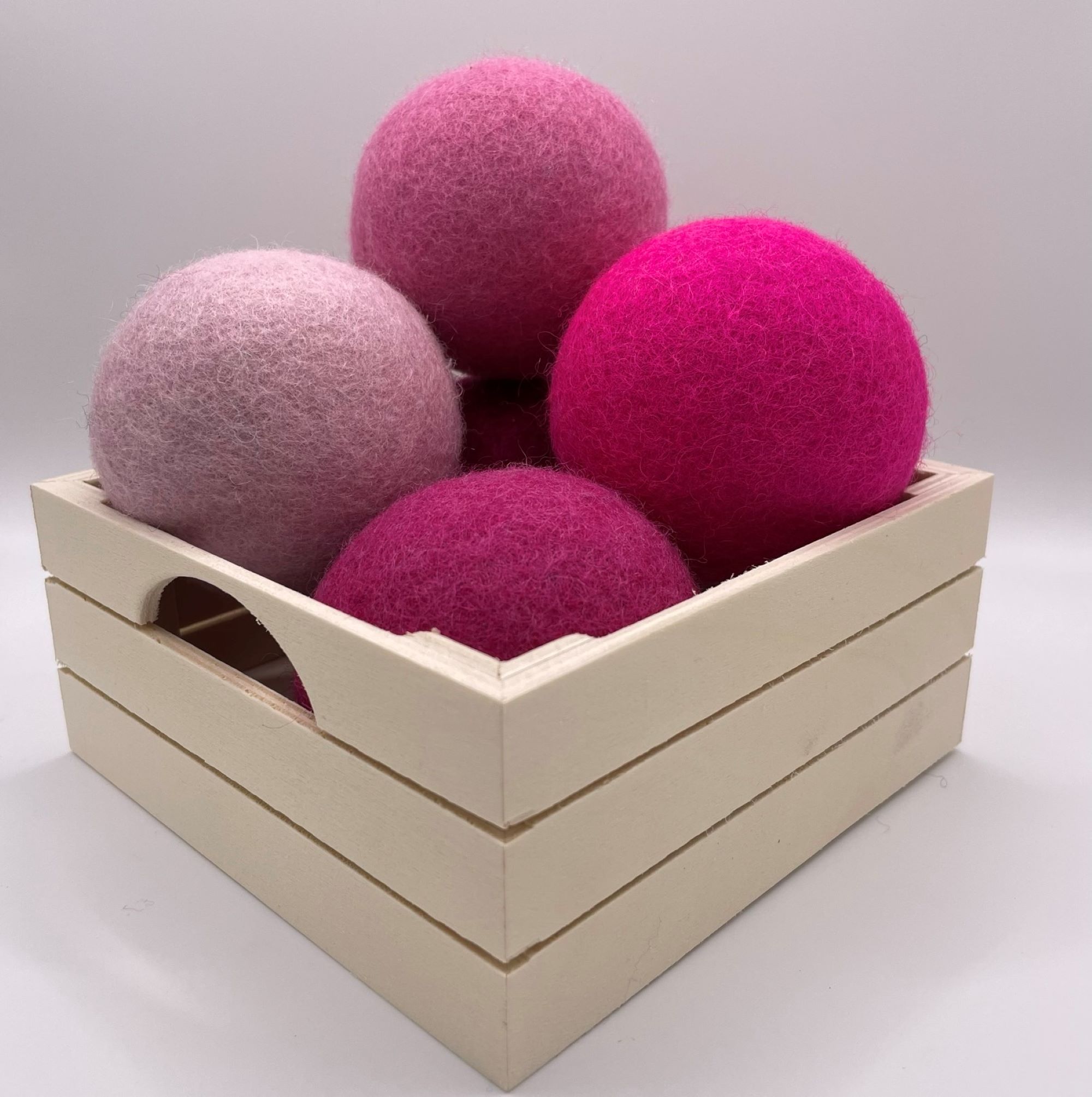Pink dryer balls in box