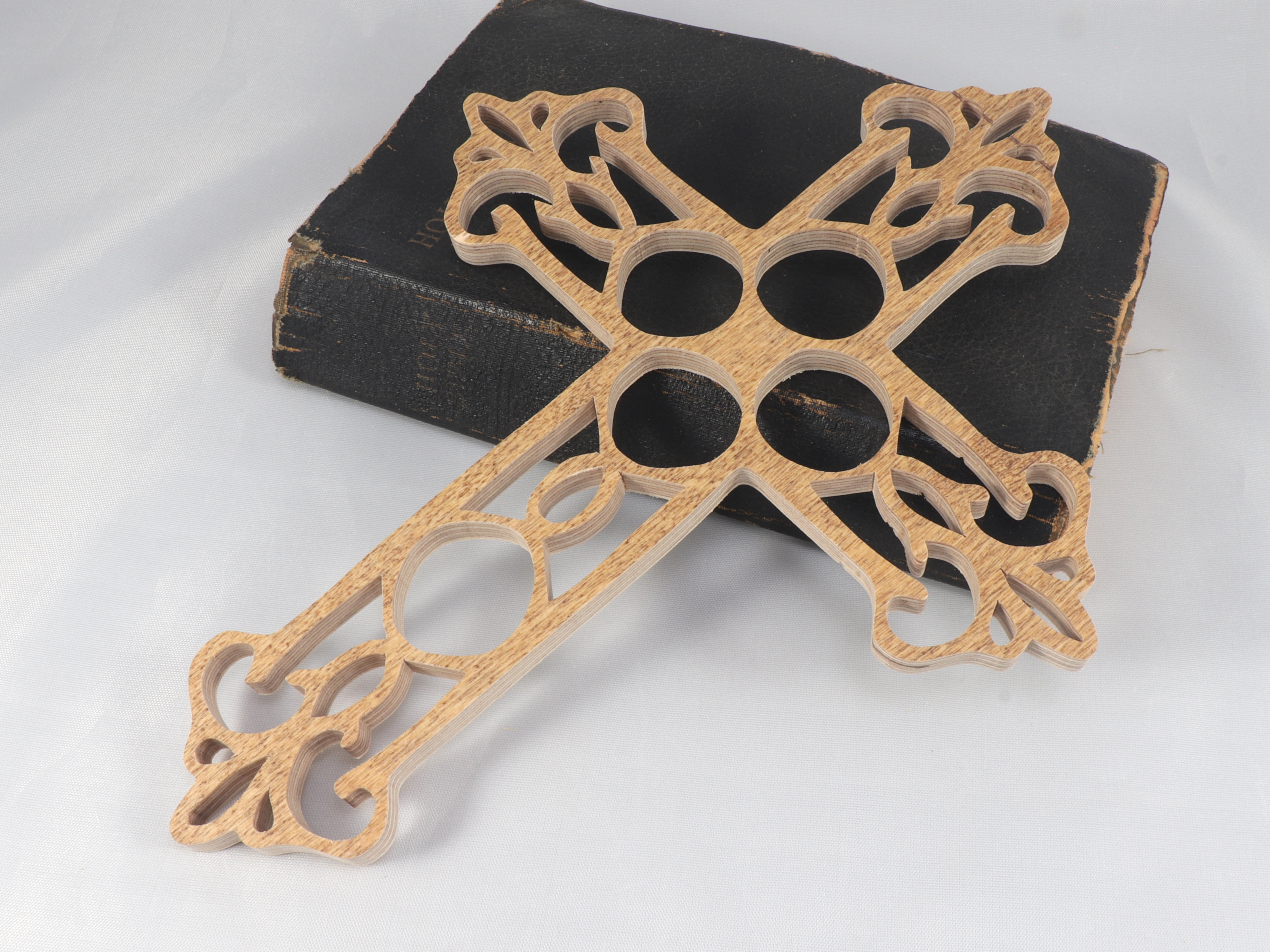 This beautiful handmade rustic fretwork cross is made from reclaimed hardwood flooring samples and adds a touch of rustic elegance to your home.