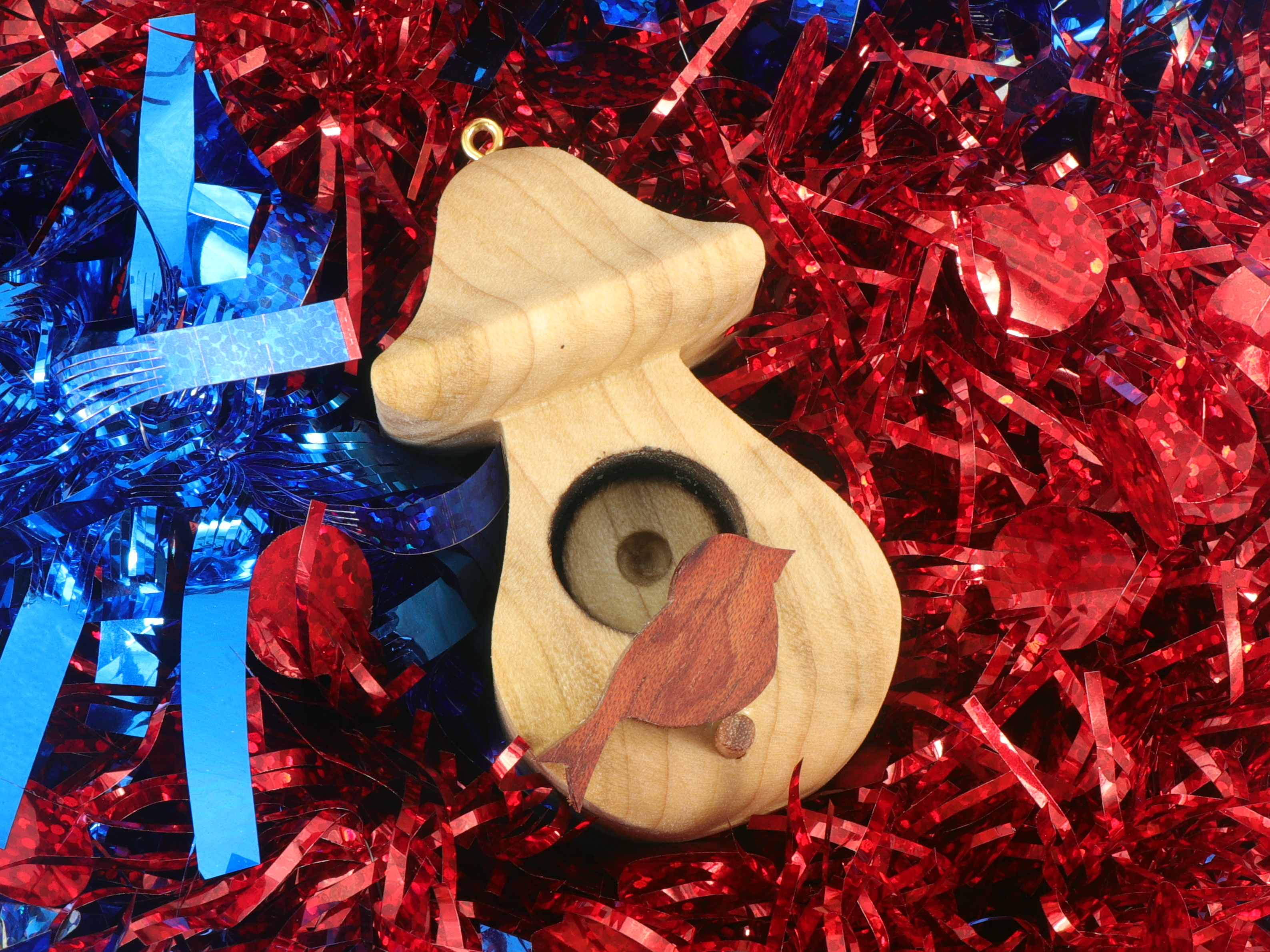 Handmade Wood Birdhouse Ornament Collectable Christmas Tree Ornament shapeed like a Christmas tree. Made from select-grade hardwoods, hand-sanded, and finished with a custom blend of oils and waxes using traditional woodworking tools.