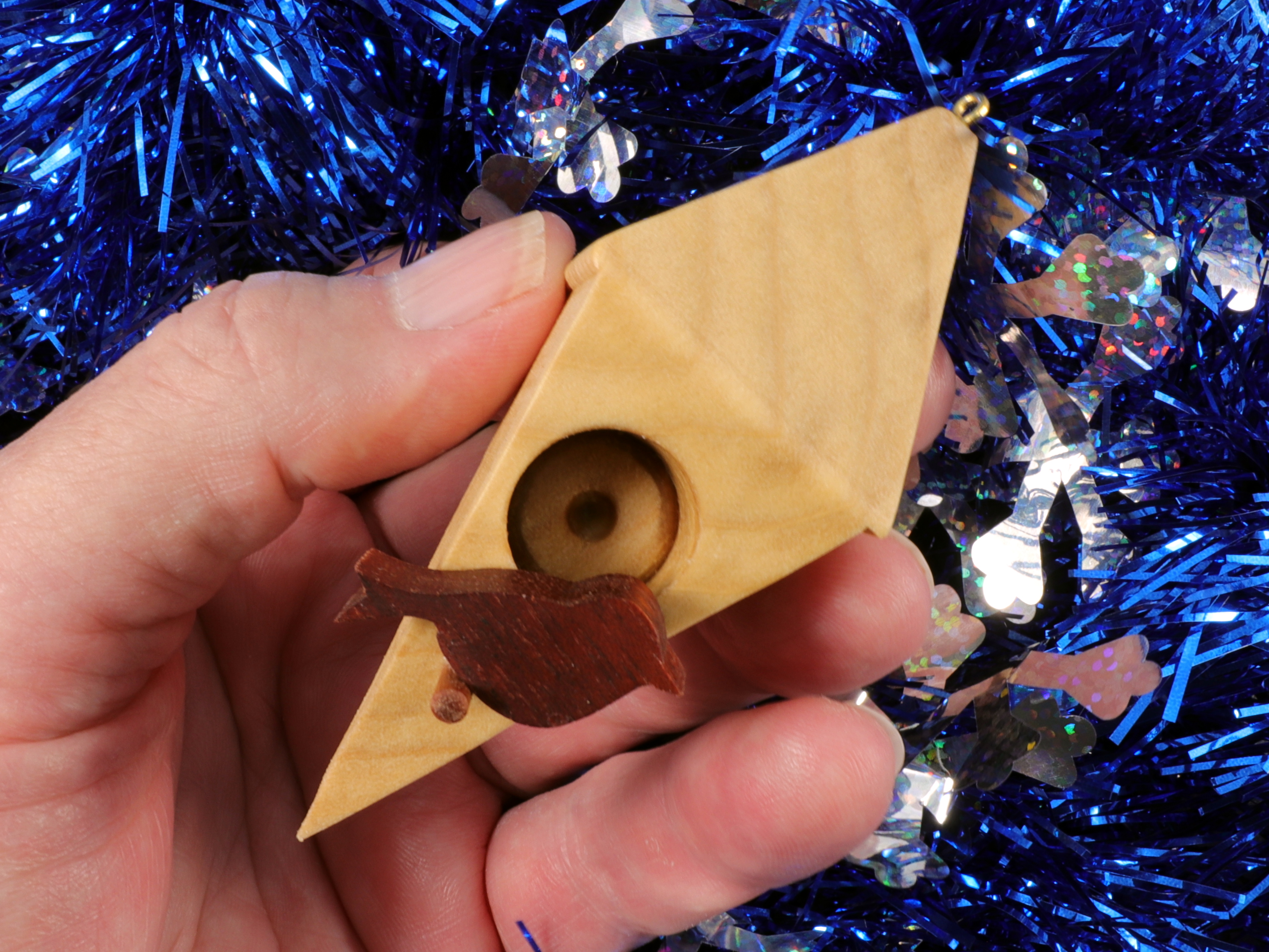 Handmade Wood Birdhouse Ornament Collectable Christmas Tree Ornament shapeed like a Christmas tree. Made from select-grade hardwoods, hand-sanded, and finished with a custom blend of oils and waxes using traditional woodworking tools.