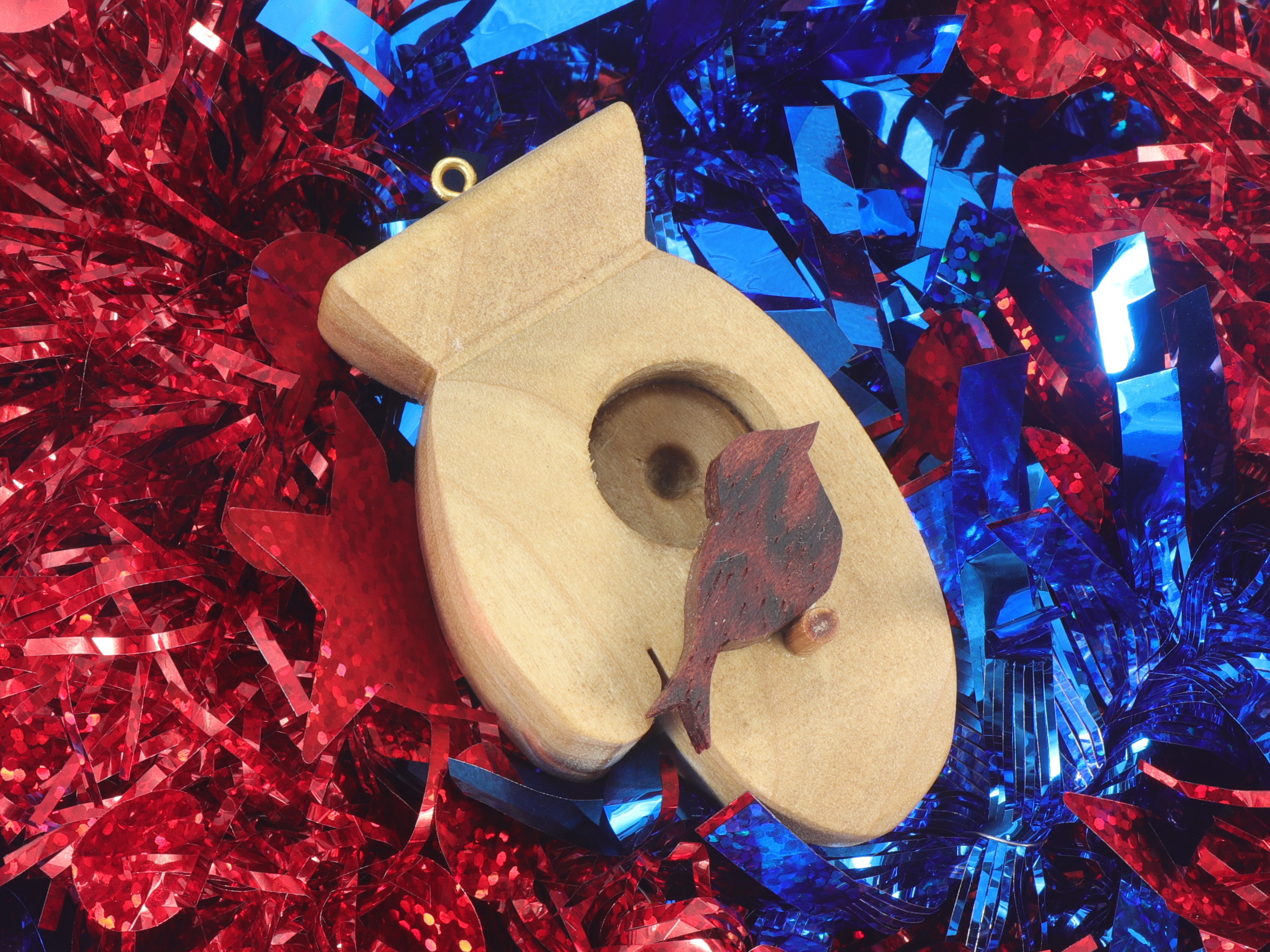 Handmade Wood Birdhouse Ornament Collectable Christmas Tree Ornament shapeed like a Christmas tree. Made from select-grade hardwoods, hand-sanded, and finished with a custom blend of oils and waxes using traditional woodworking tools.
