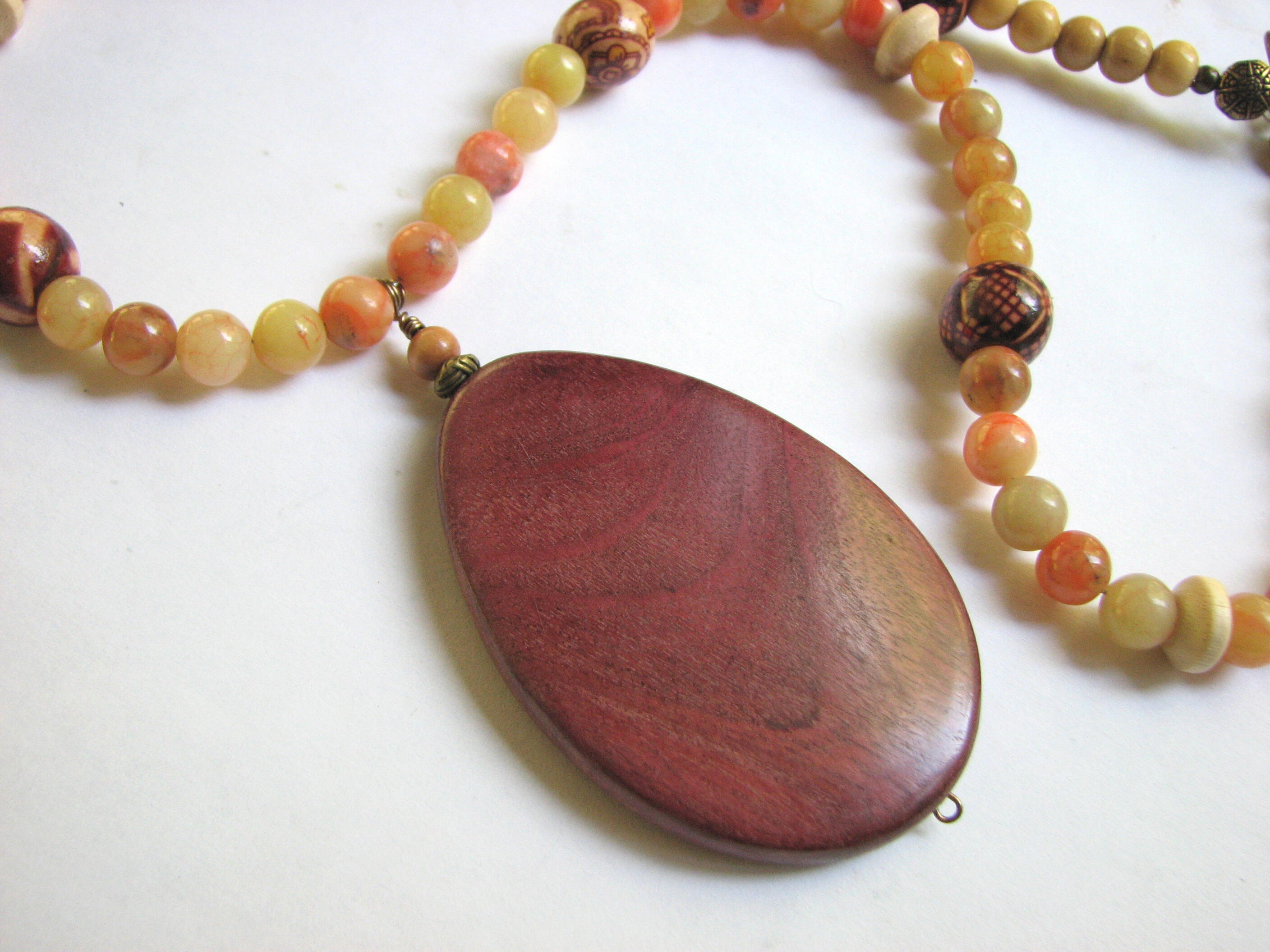 Large pendant of natural Costa Rican Purple Heart wood.