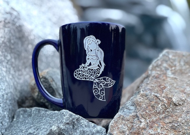 Engraved ceramic mug in navy blue with silver mermaid