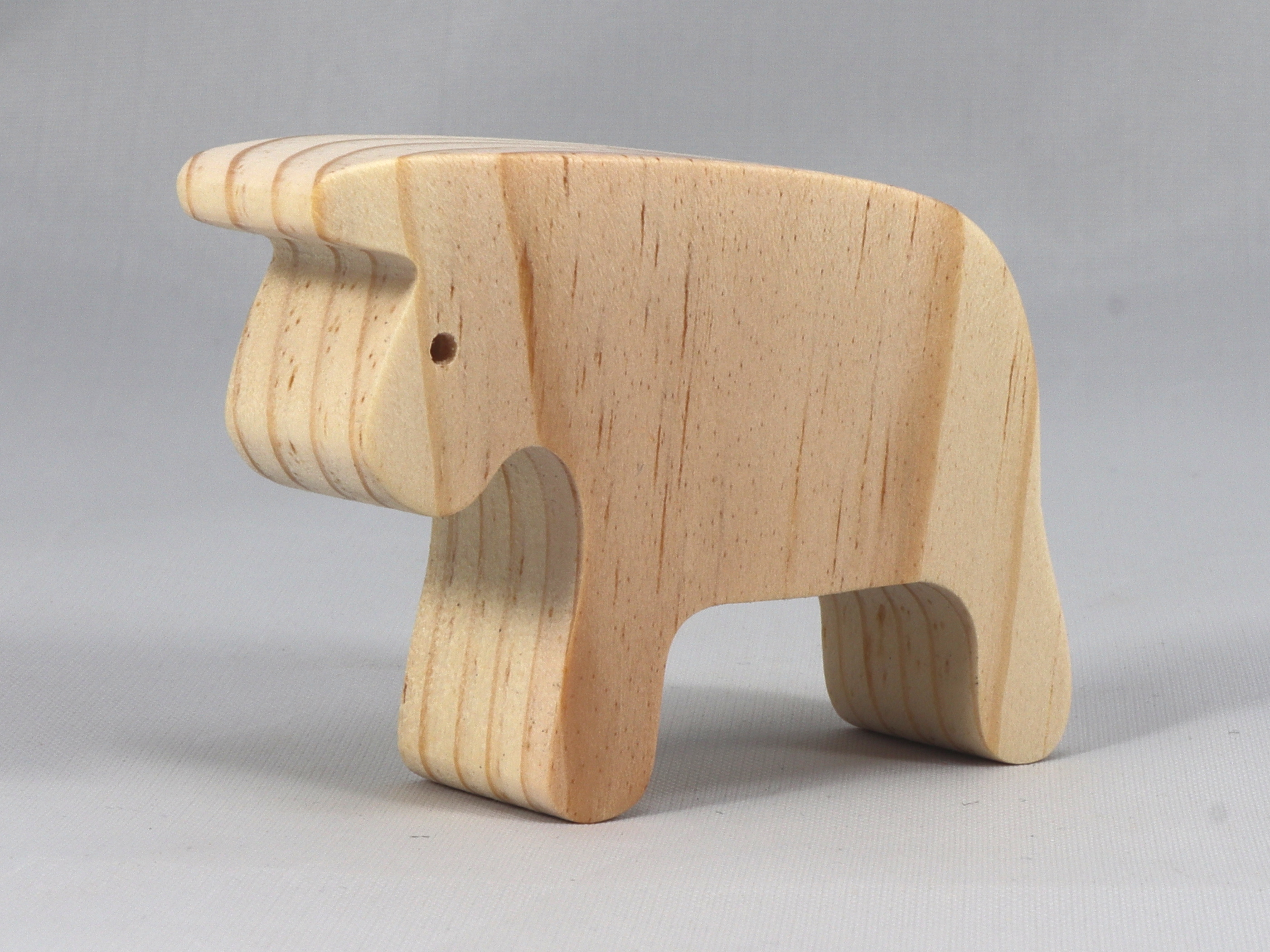 Handmade wooden bull toy cutout unpainted and ready to paint. It is free standing and stackable. From my Itty Bitty Animal Collection.