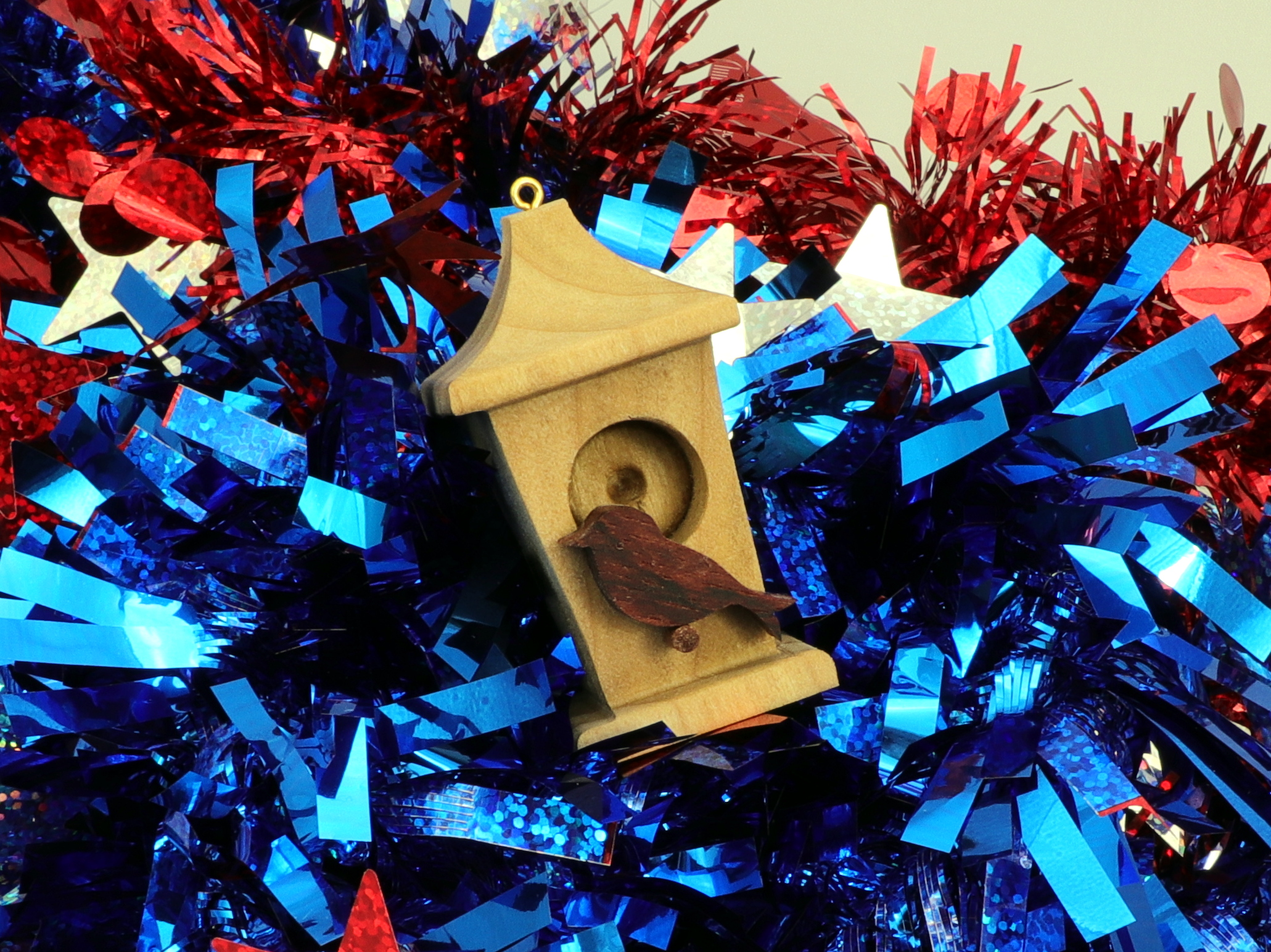 Handmade Wood Birdhouse Ornament Collectable Christmas Tree Ornament shapeed like a Christmas tree. Made from select-grade hardwoods, hand-sanded, and finished with a custom blend of oils and waxes using traditional woodworking tools.