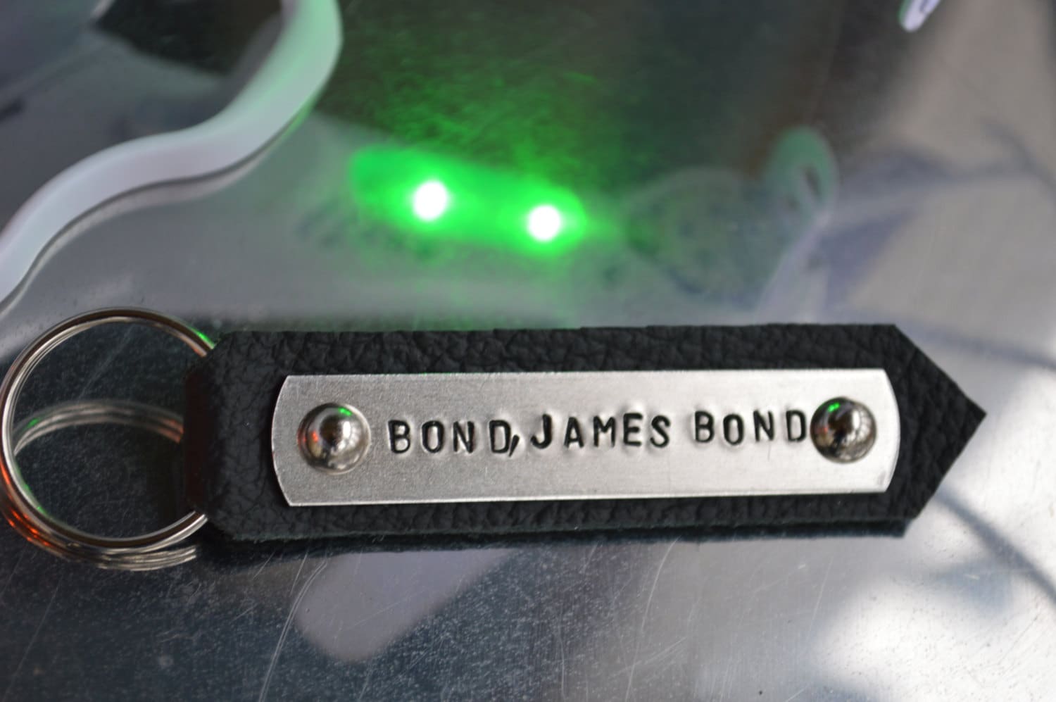 Products BOND, JAMES BOND hand stamped keychain. On aluminum using