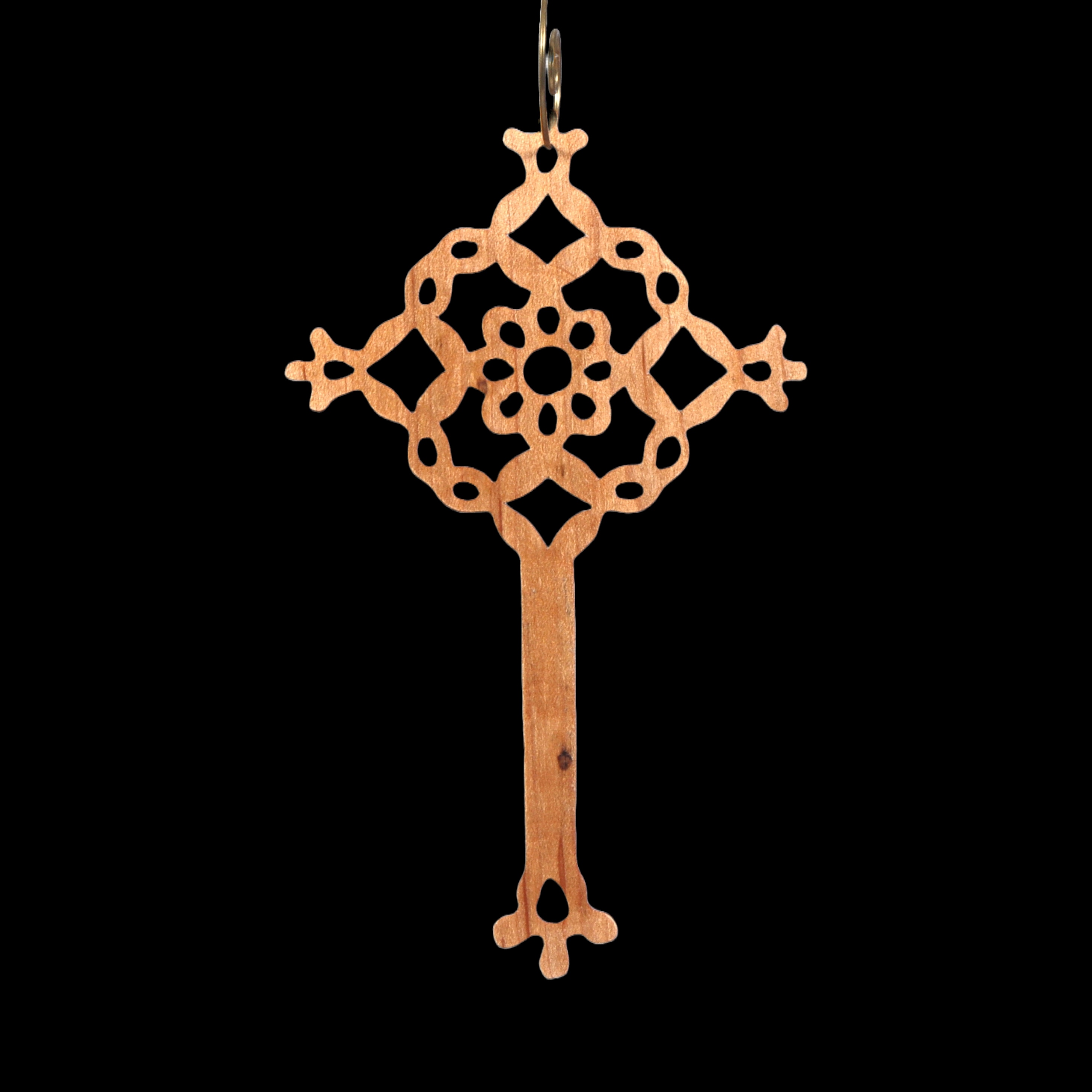 A beautiful handmade wood fretwork Christmas tree ornament in a classic Victorian icicle style. This delicate ornament is hand finished with clear shellac for a timeless look. It is the perfect addition to any Christmas tree collection.