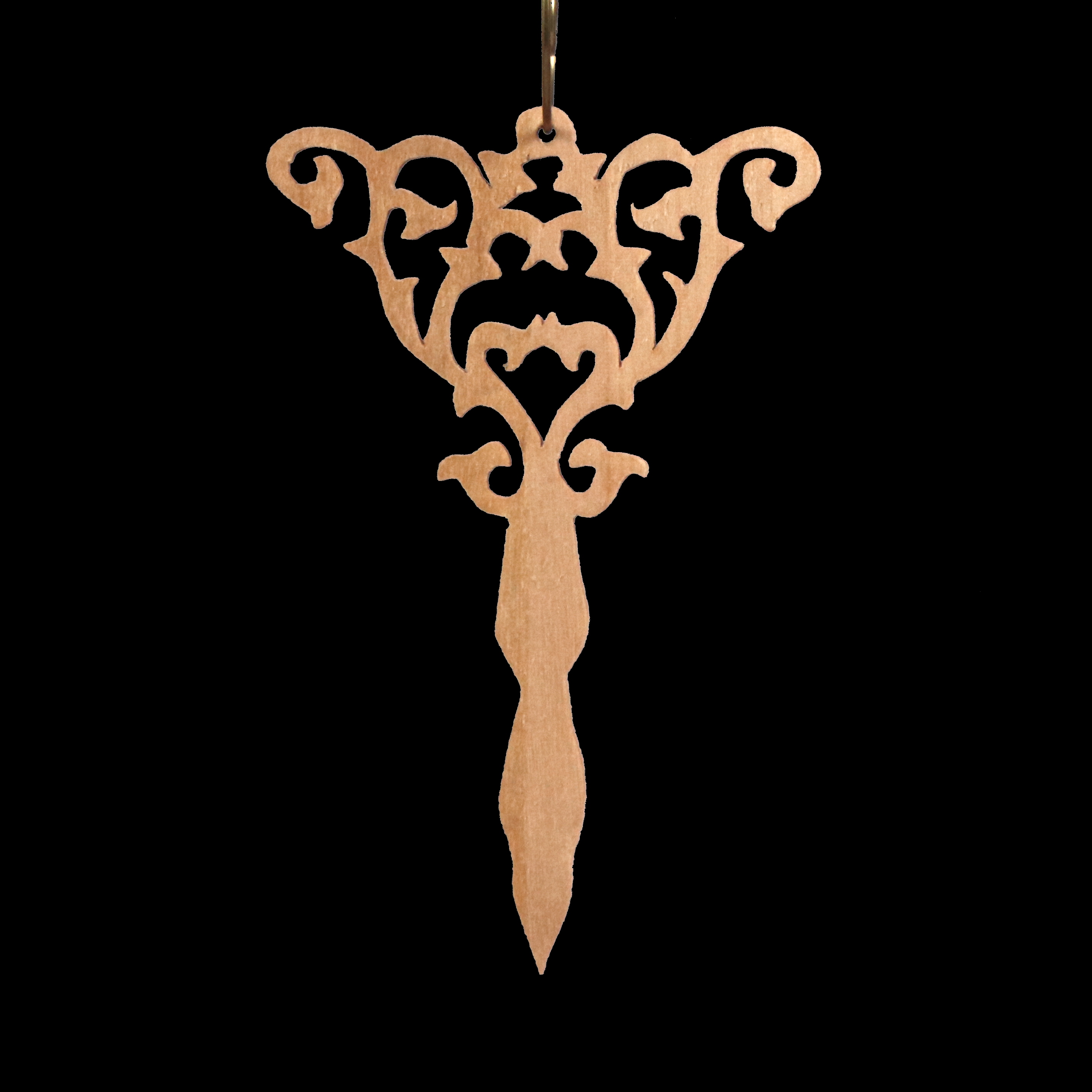 A beautiful handmade wood fretwork Christmas tree ornament in a classic Victorian icicle style. This delicate ornament is hand finished with clear shellac for a timeless look. It is the perfect addition to any Christmas tree collection.