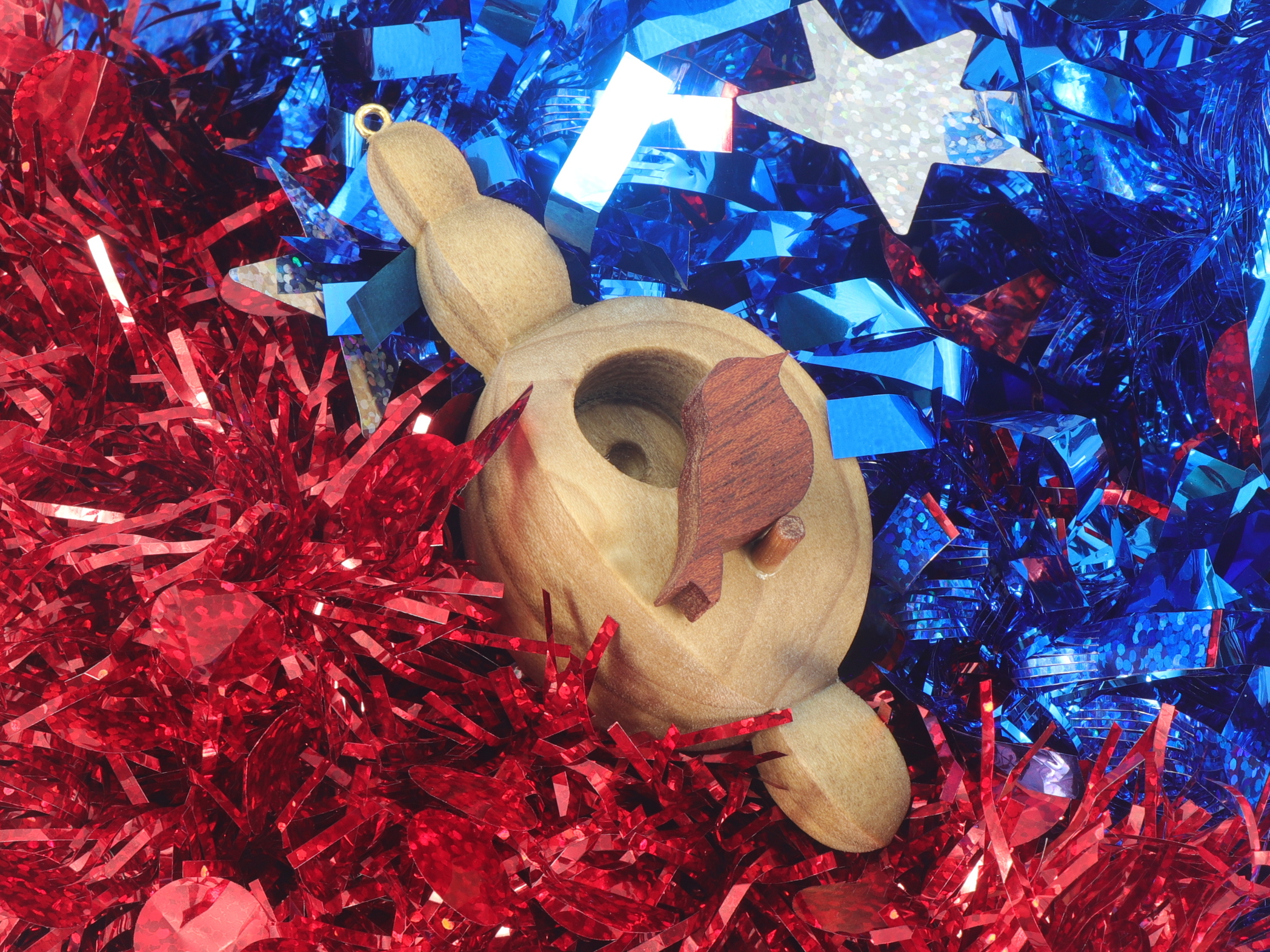 Handmade Wood Birdhouse Ornament Collectable Christmas Tree Ornament shapeed like a Christmas tree. Made from select-grade hardwoods, hand-sanded, and finished with a custom blend of oils and waxes using traditional woodworking tools.