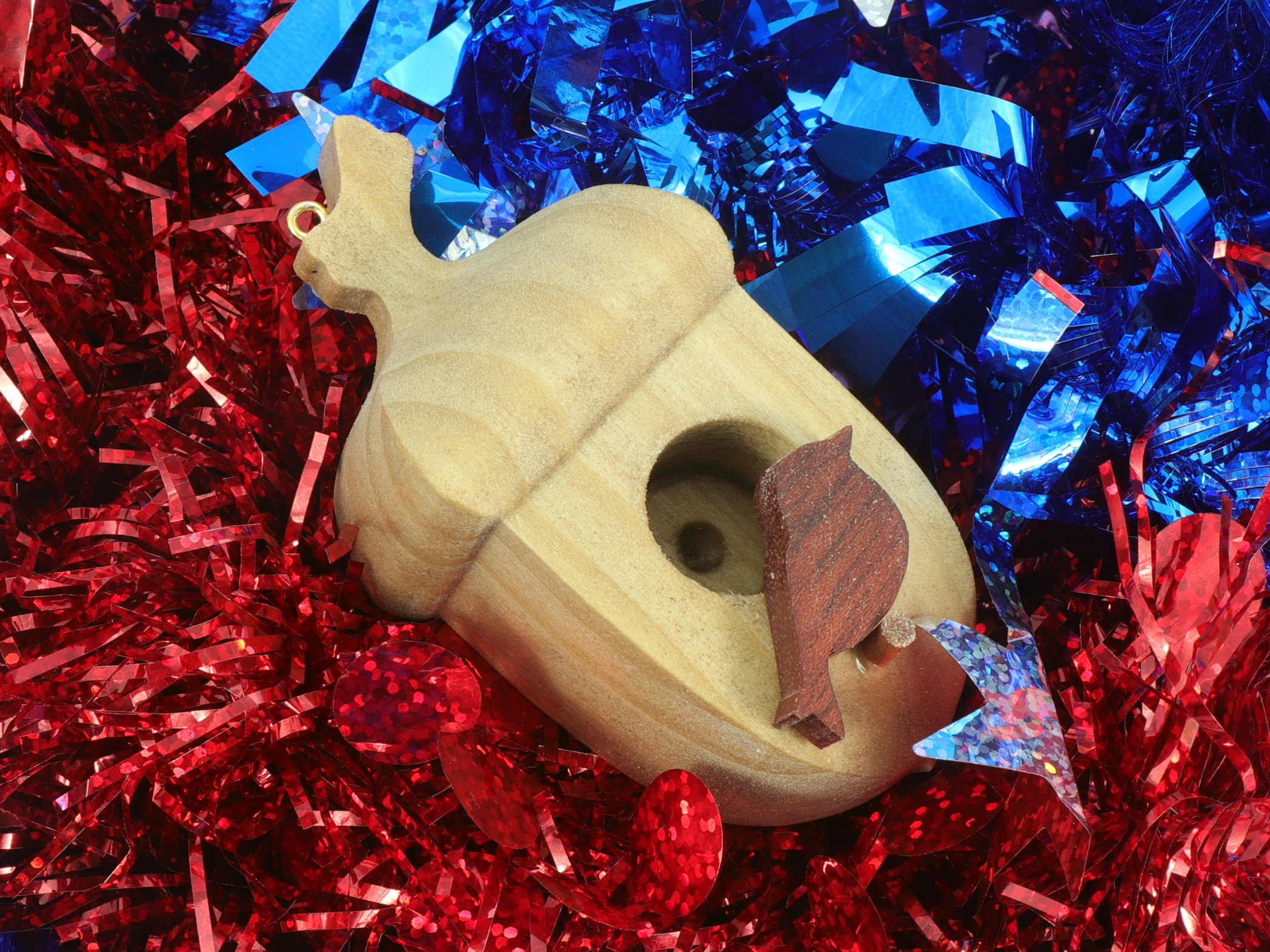 Handmade Wood Birdhouse Ornament Collectable Christmas Tree Ornament shapeed like a Christmas tree. Made from select-grade hardwoods, hand-sanded, and finished with a custom blend of oils and waxes using traditional woodworking tools.