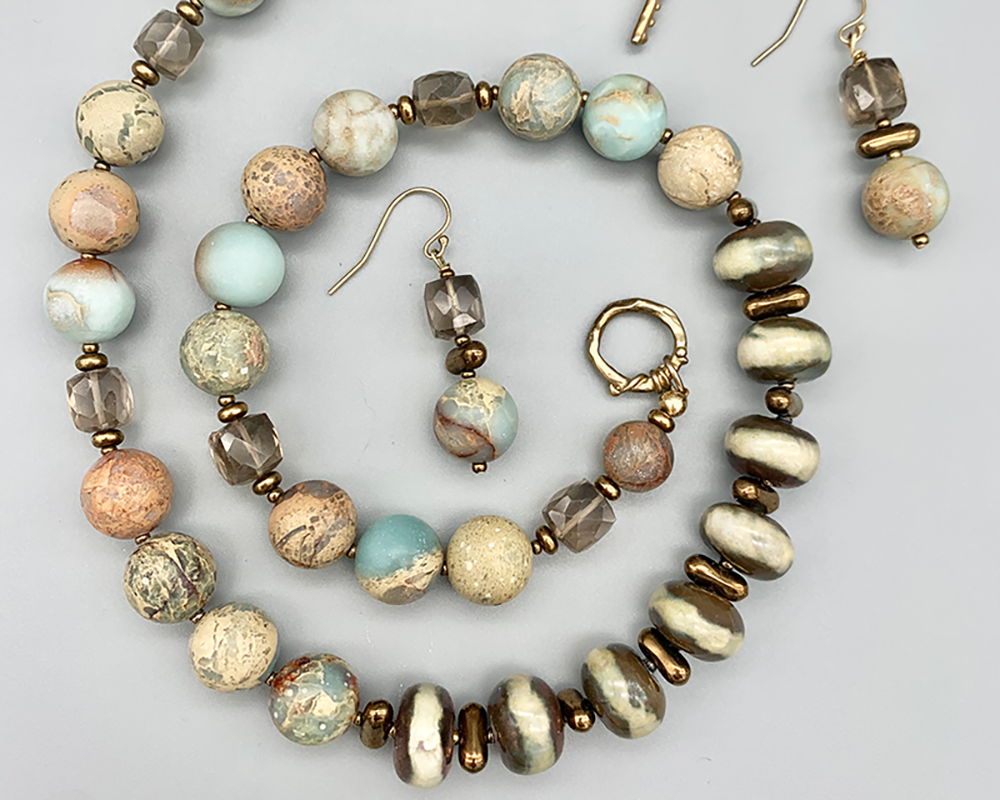 Necklace set | Ivory iridescent raku rondelles , snakeskin jasper rounds, faceted smoky quartz cubes