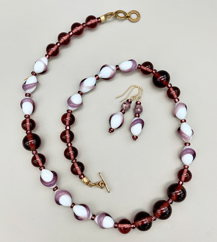 Necklace set | Opalescent lampwork ovals ringed in amethyst swirls, Cherry Brand amethyst glass rounds