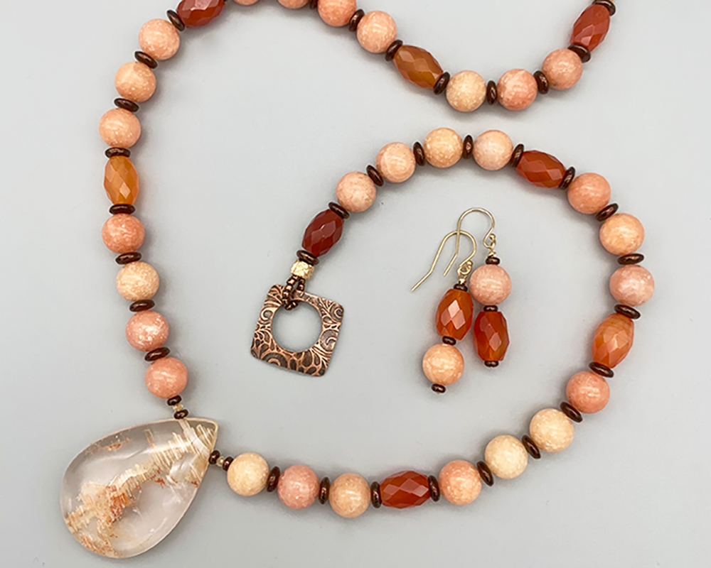 Necklace set | Lodolite "Shaman's Dream" pendant, orange calcite rounds, carnelian faceted ovals, etched copper artisan clasp