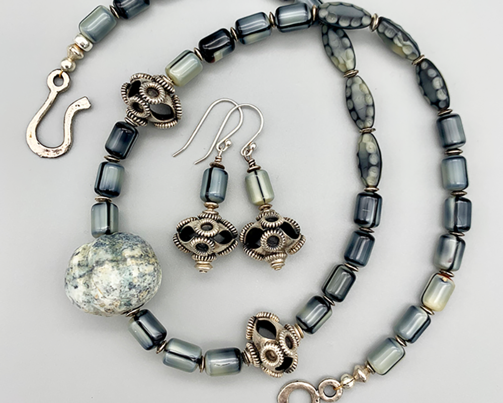 Necklace set | Carved focal stone, pearly gray vintage glass beads, sterling silver rondelles, "flying saucer" Bali silver