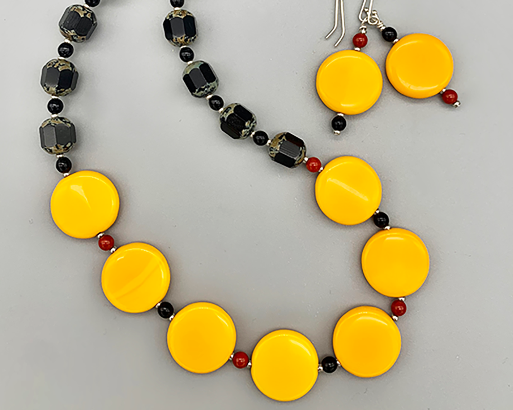 Necklace set | Yellow/orange vintage glass disks, black turbines, coral and blackstone spacer beads