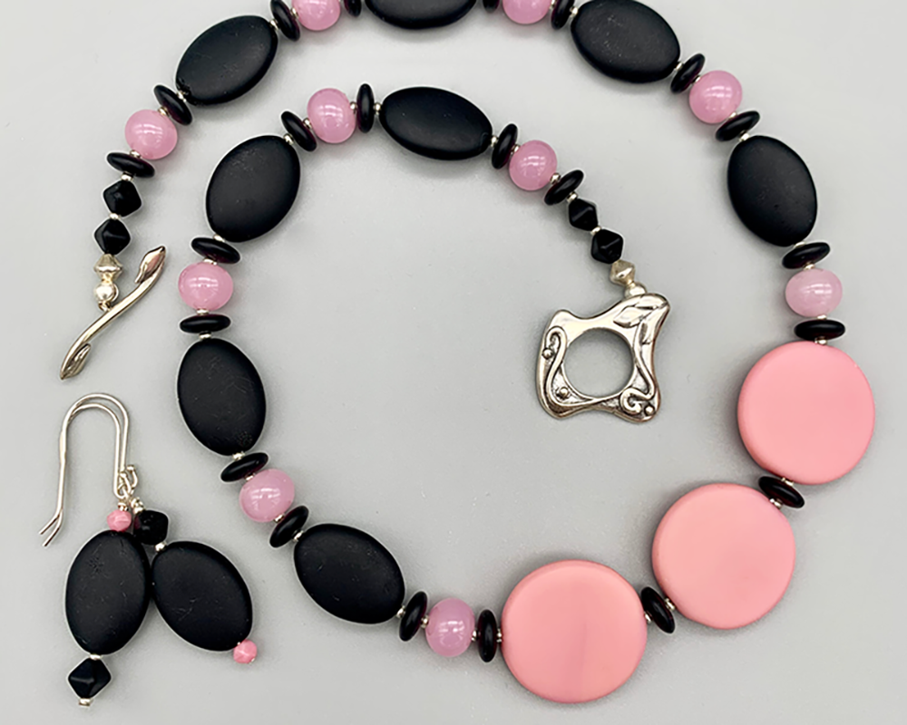 Necklace set | Mid-century pink and black palette, eye-catching pink focal disks, sterling silver clasp
