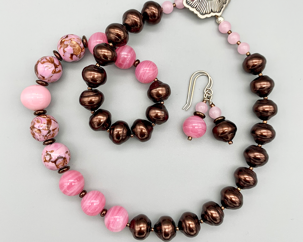 Necklace set | Pink swirl rounds and pink/aventurina vintage glass beads, dark copper glass pearls, finely detailed sterling clasp