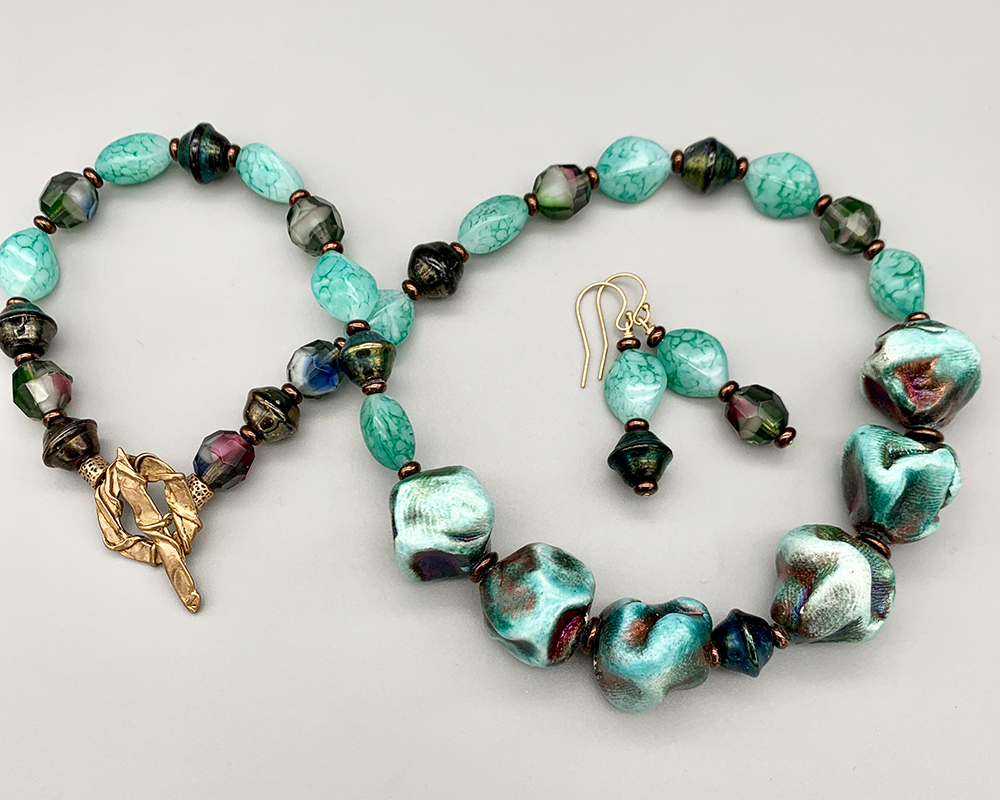 Necklace set | Blue-green and copper raku nuggets, vintage givre, faux-stone, metallic glass beads