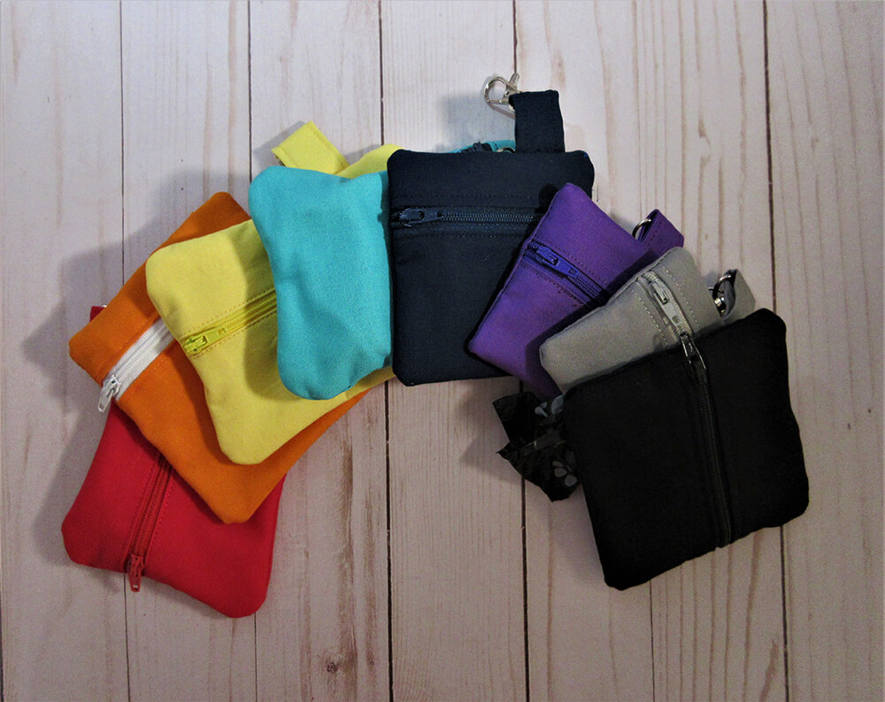 Your Fur Baby is adorable – but sometime they just have to go – poop that is. You can be ready?

Give one of these pretty zip bags to hold the bags you need for the quick pick up while you walk your dog. We have many colors and  two shapes

Square  4" x 4"  or Bone shape 3 1/2" x 5"
