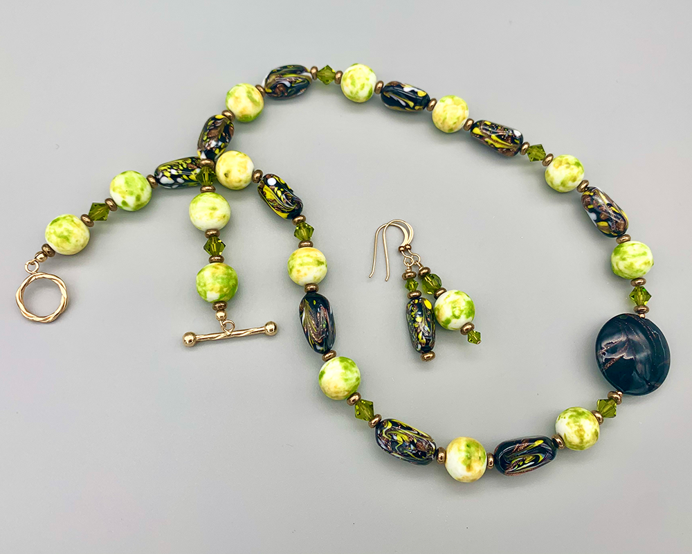 Necklace set | Vintage lampwork, glass beads, and crystals, Venetian aventurina focal disk