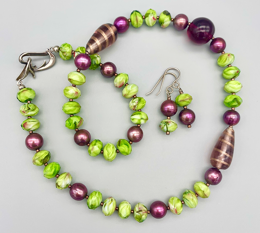 Necklace set | Lime green and violet palette of vintage and contemporary glass beads with freshwater pearls