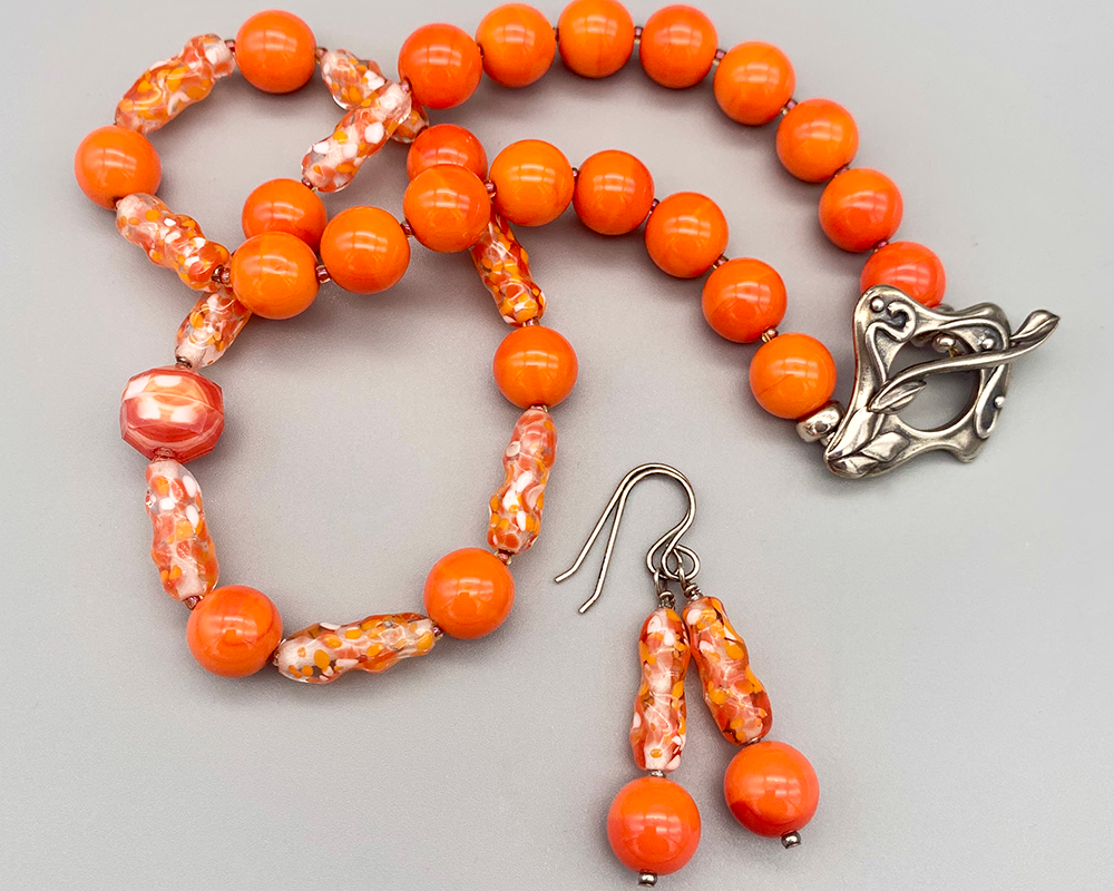 Necklace set | Vivid orange vintage glass rounds, clear/orange/white ovular baroque beads