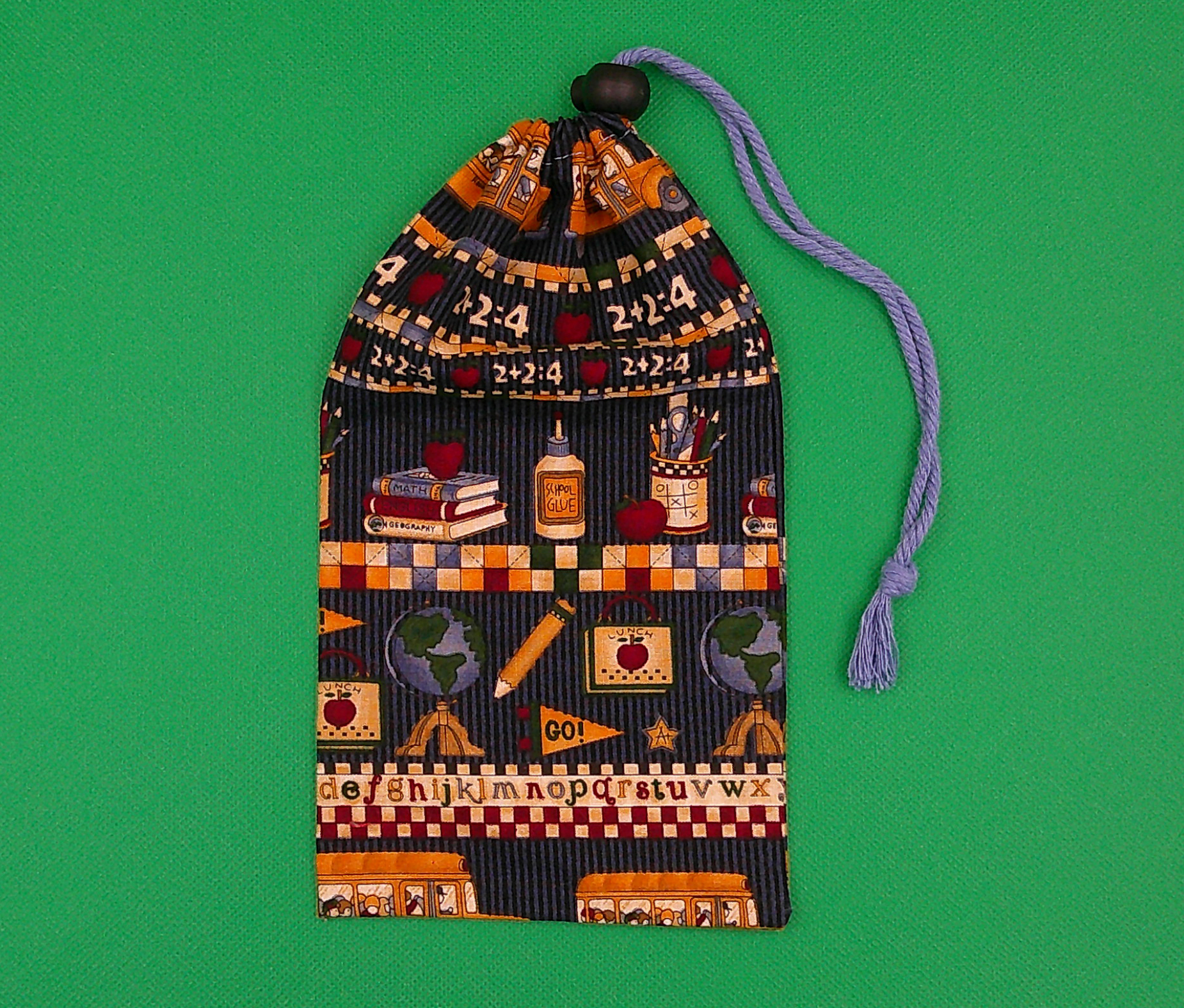 A nice, simple colorful bag with a blue cord and toggle. A nice, simple colorful bag with a blue cord and toggle.