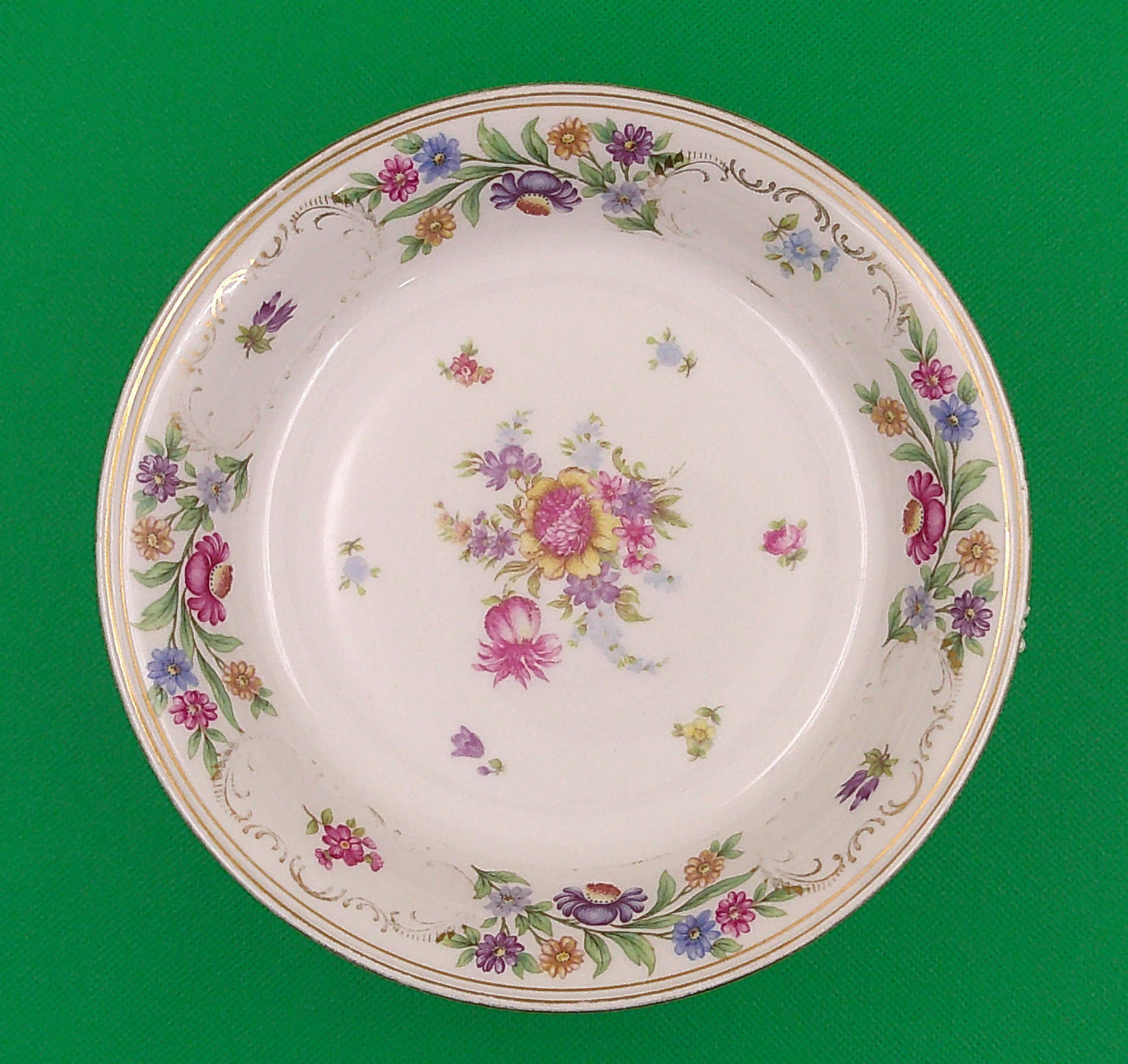 A pretty china dish for holding your jewelry. A pretty china dish for holding your jewelry.