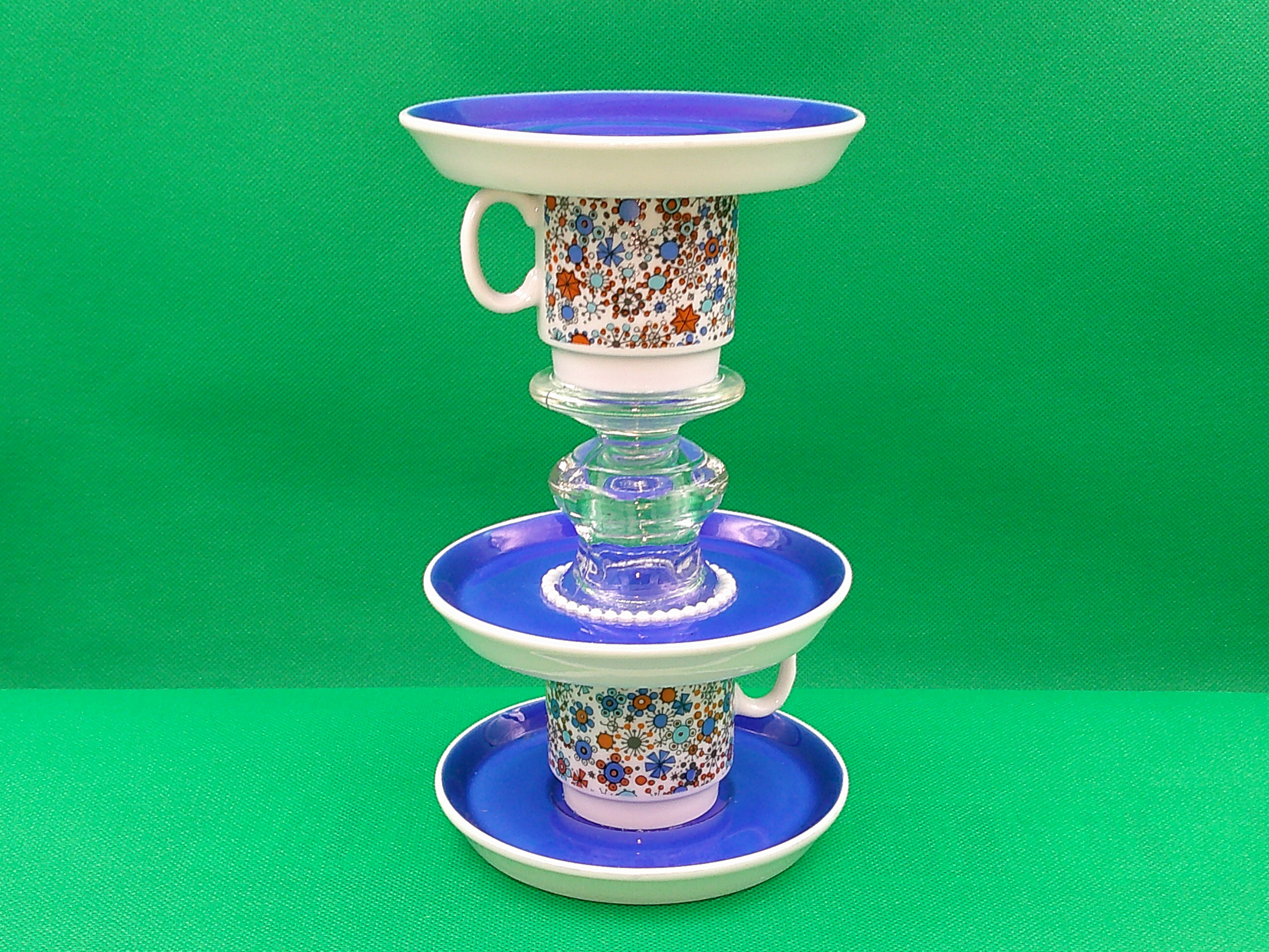 Vibrant cobalt blue tower jewelry dish is stunning and draws your attention immediately. It's almost 8 inches high by 4 plus inches wide.  Vibrant cobalt blue tower jewelry dish is stunning and draws your attention immediately. It's almost 8 inches high by 4 plus inches wide.