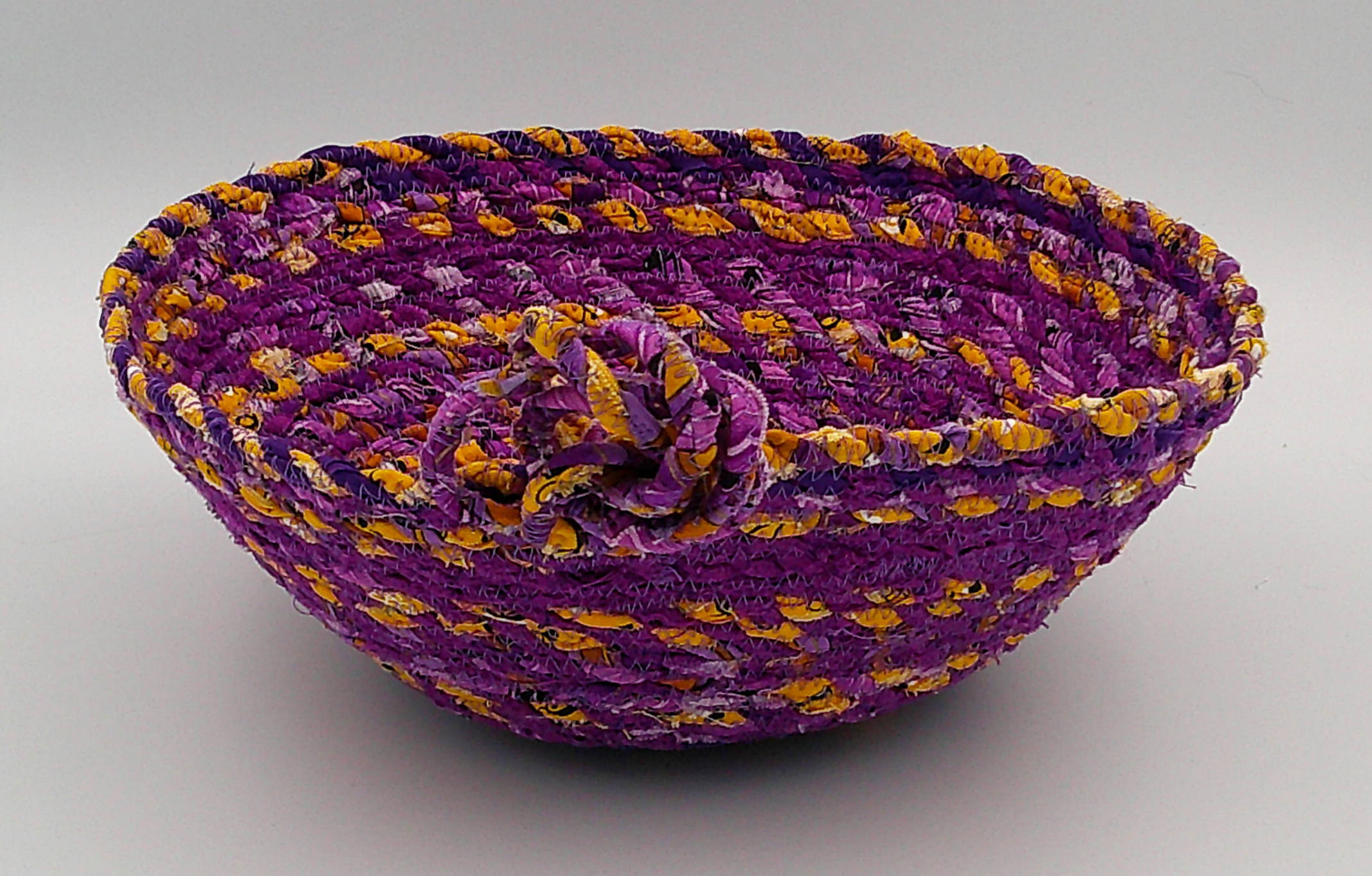 This is looking directly at the basket with the knot in front. The base is 6 inches. At 9.5 inches wide, the depth of 4 inches is ample. This is looking directly at the basket with the knot in front. The base is 6 inches. At 9.5 inches wide, the depth of 4 inches is ample.