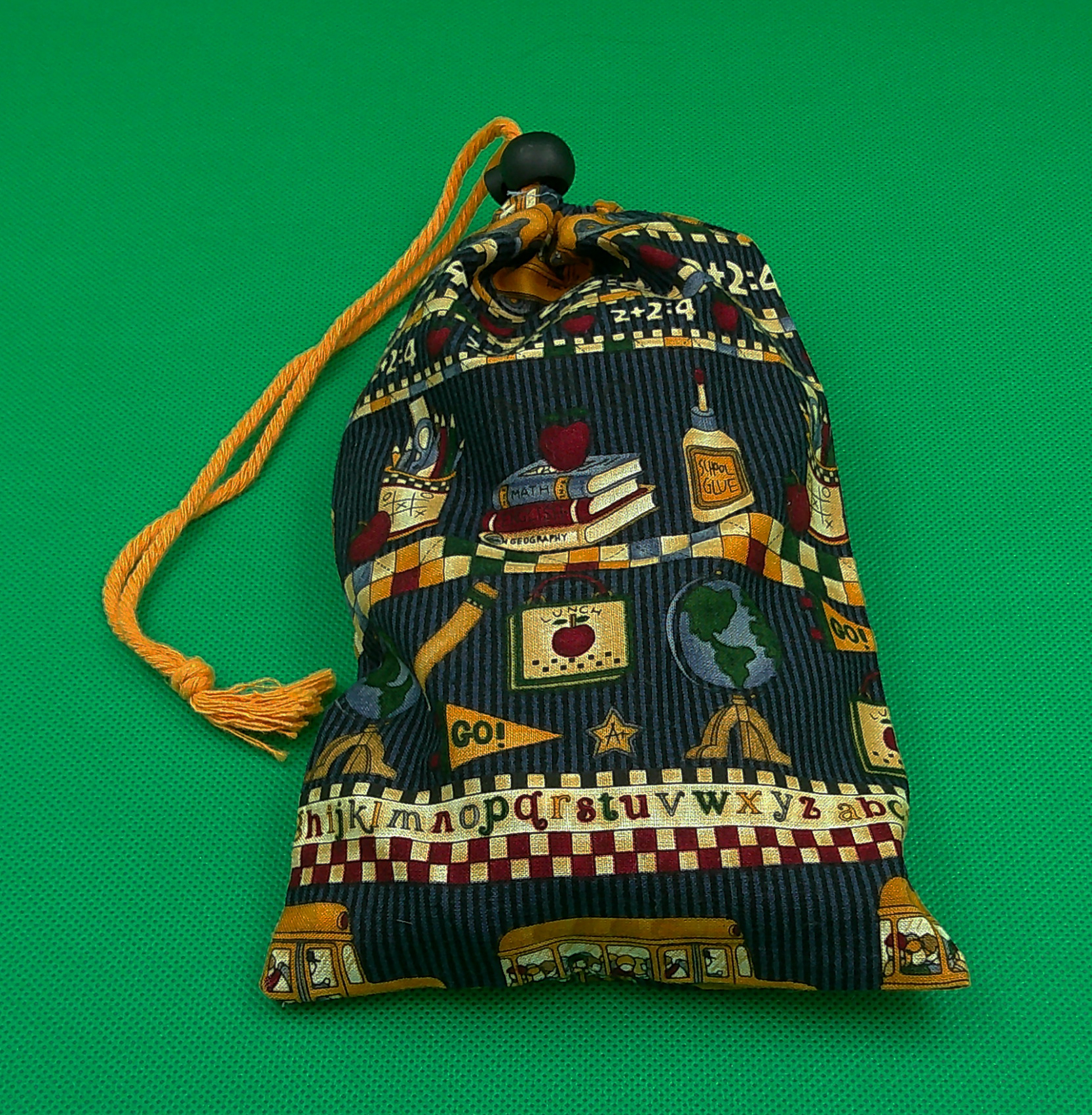 This game bag has a yellow cord with a round toggle. There is another one with a rectangular toggle that's just a smidge smaller. This game bag has a yellow cord with a round toggle. There is another one with a rectangular toggle that's just a smidge smaller.