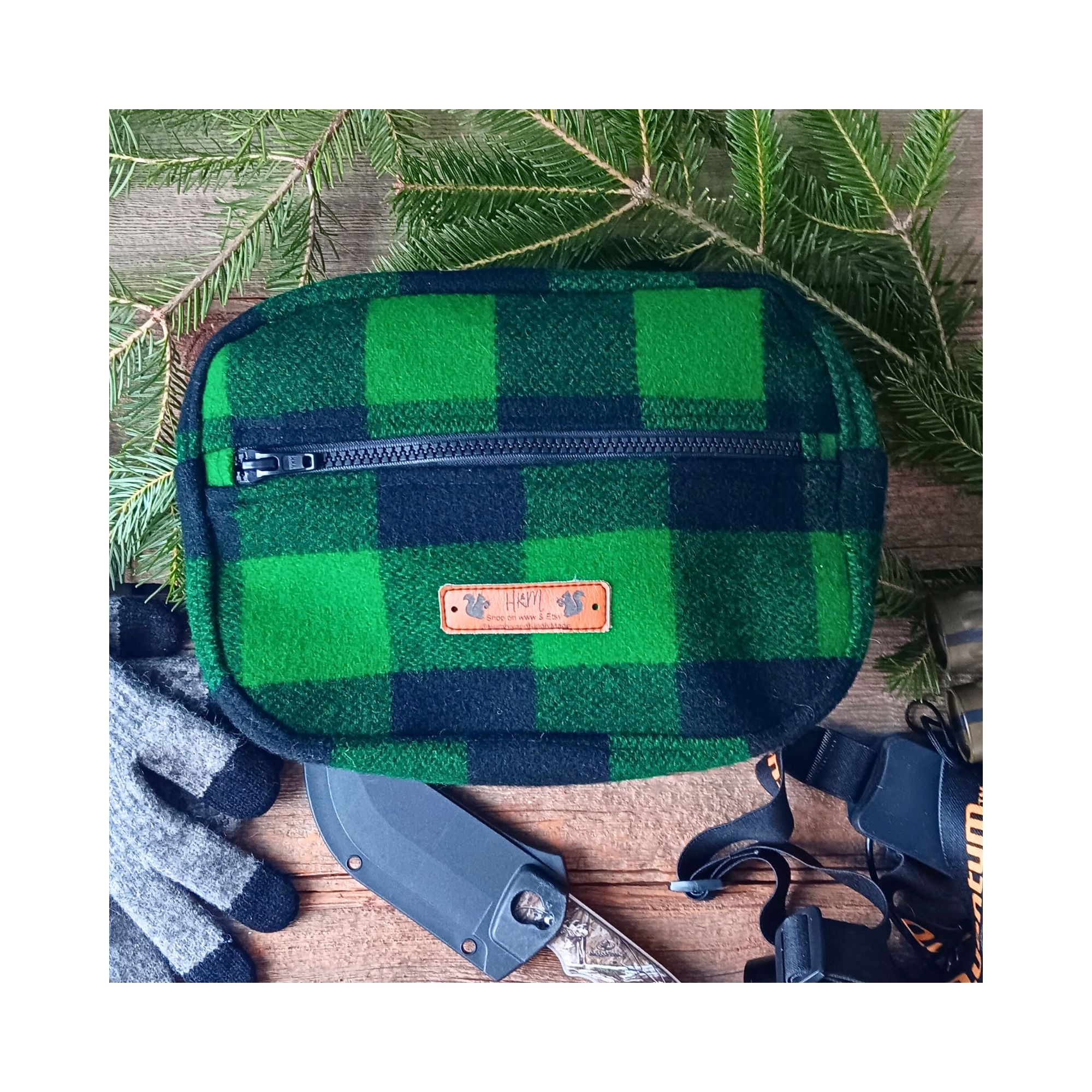Green & black check wool hunting belt bag handcrafted from Johnson Woolen Mills virgin wool. Rugged outdoorsman waist pack for deer hunting. Green & black check wool hunting belt bag handcrafted from Johnson Woolen Mills virgin wool. Rugged outdoorsman waist pack for deer hunting.