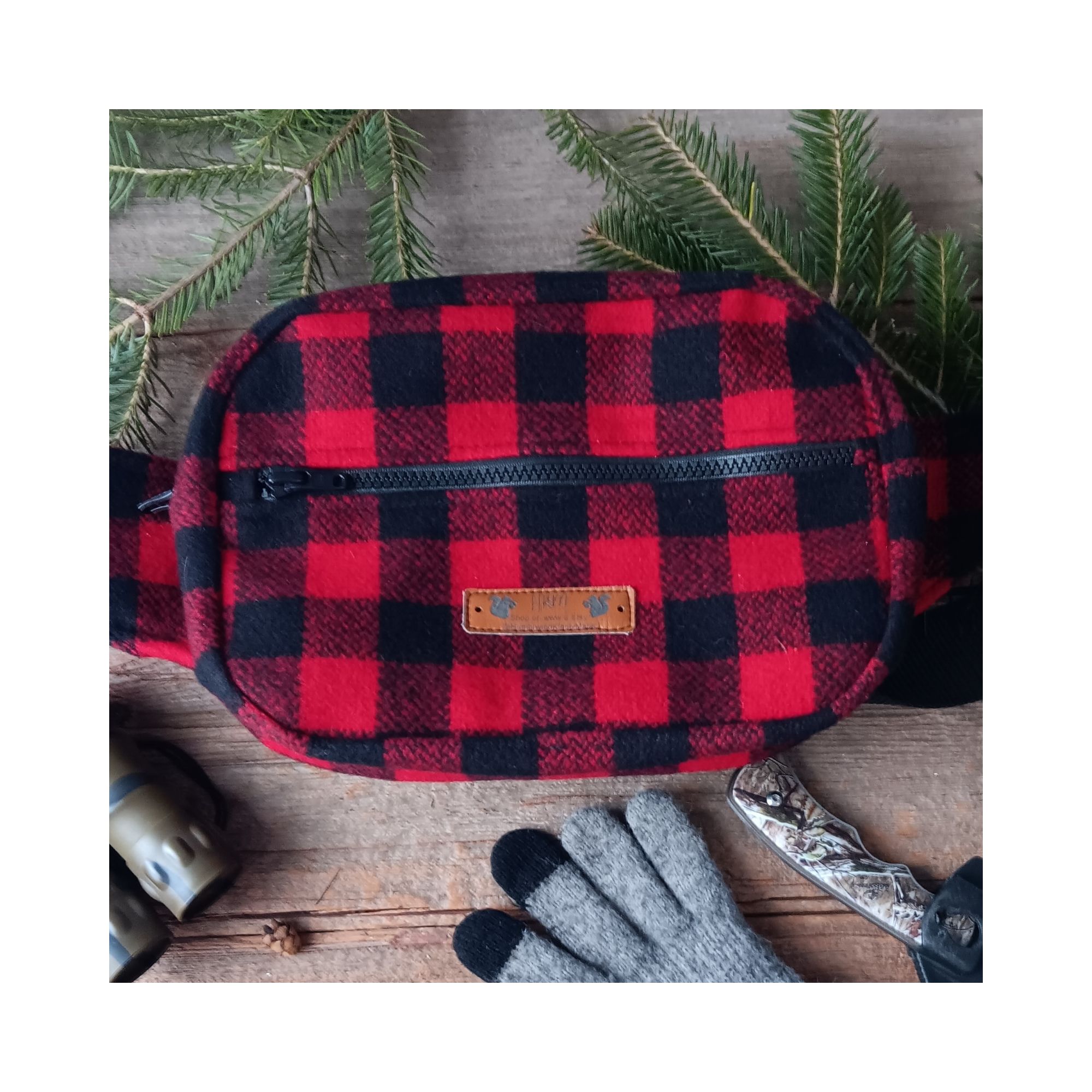 Red & black check wool hunting belt bag handcrafted from Johnson Woolen Mills virgin wool. Rugged outdoorsman waist pack for deer hunting. Red & black check wool hunting belt bag handcrafted from Johnson Woolen Mills virgin wool. Rugged outdoorsman waist pack for deer hunting.