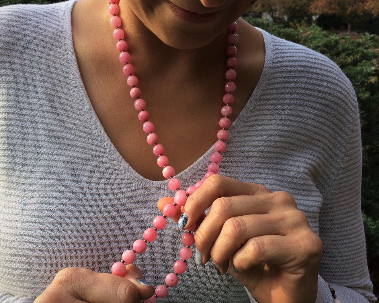 Pink beaded necklace with silver accents