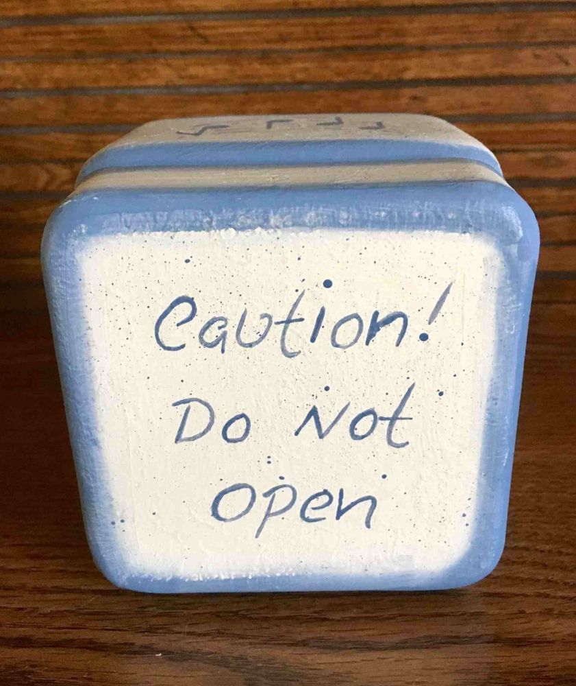 This is a cross-over for teachers of any instruments.  The jar is creme  incolor and country blue.  Blue staff with notes, blue trim and the phrase. CAUTION DO NOT OPEN -WRONG NOTES PLAYED BY MY STUDENTS. For my students it was a nickel in the jar if they didn't practice....it came in real handy and cured my situation,.  You could put plastic notes,s confetti, or whatever you may think of.  It will always bring in a good laugh.