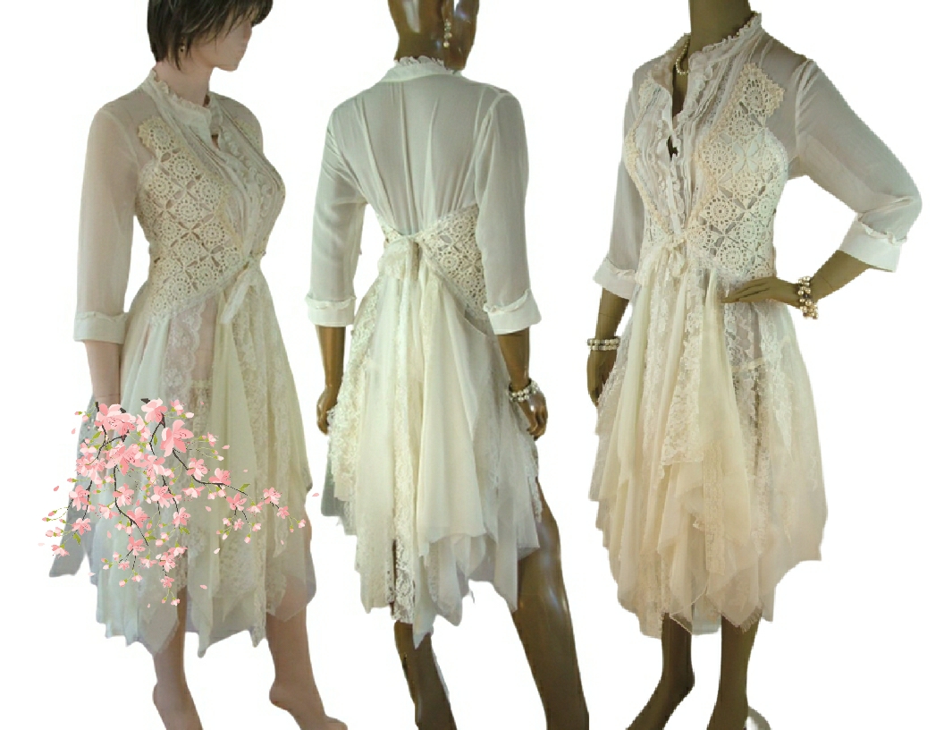 Cream 3/4 sleeve tattered wedding dress. One of a kind, hand stitched with tie up back for a snug fit.